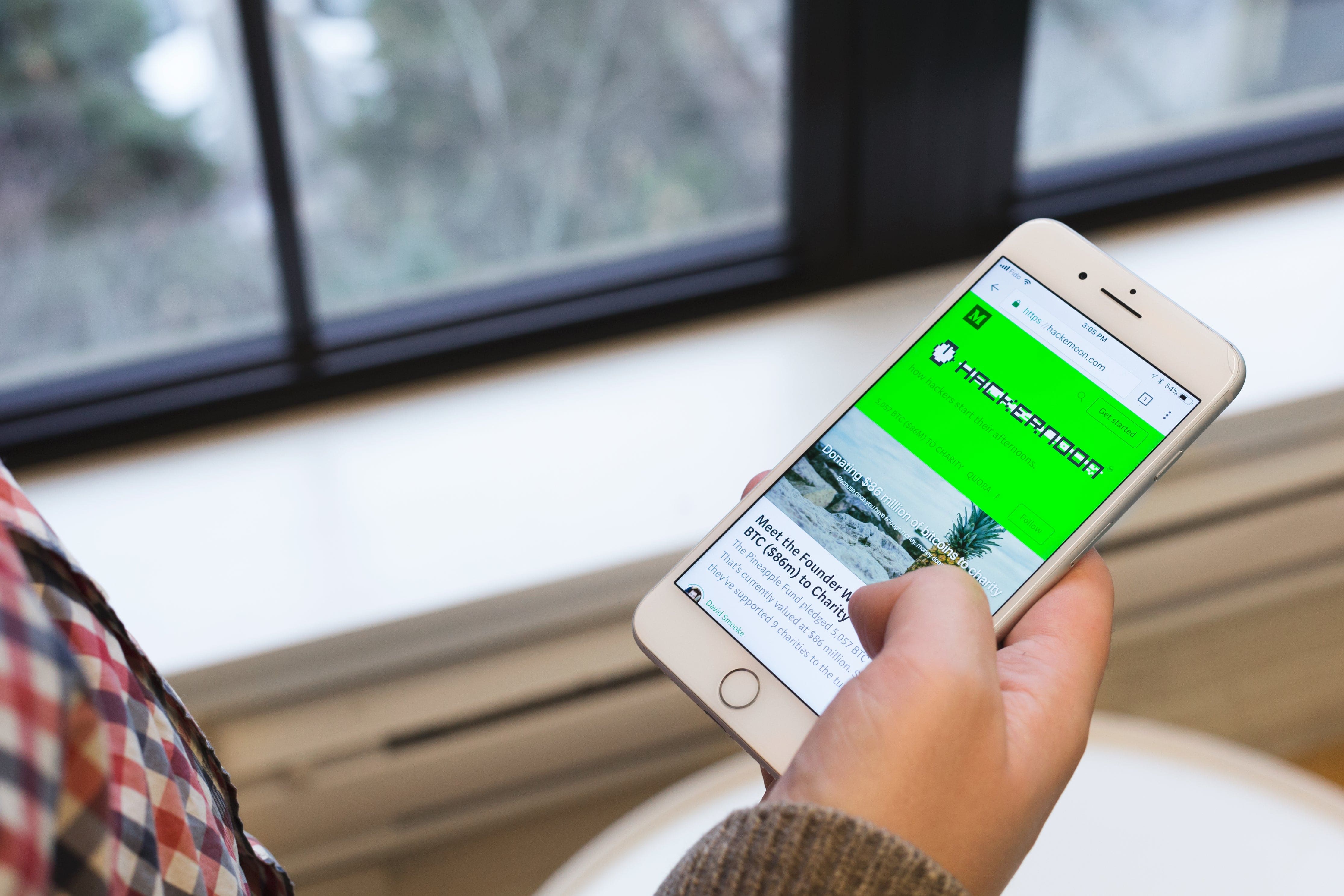 Person reading a software development blog on their phone